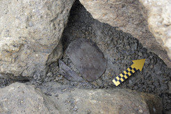 The wooden artifact in situ in the Swiss Alps.