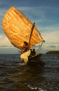 <span style="font-family: 'Times New
Roman','serif';" lang="EN-US">People of the Trobriand Islands sailing in traditional canoe in the Papua New Guinea area. The Trobrianders' language Kilivila is included in the study.</span>