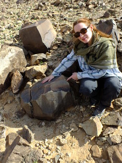 Researcher Eleanor Scerri with giant Acheulean core from which flakes were struck to create the handaxes.