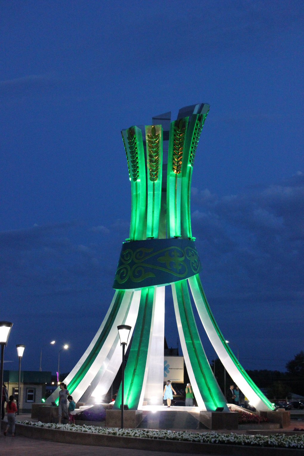 Photo of an ornamental structure in Kostanay, Kazakhstan, with a wheat stalk design.