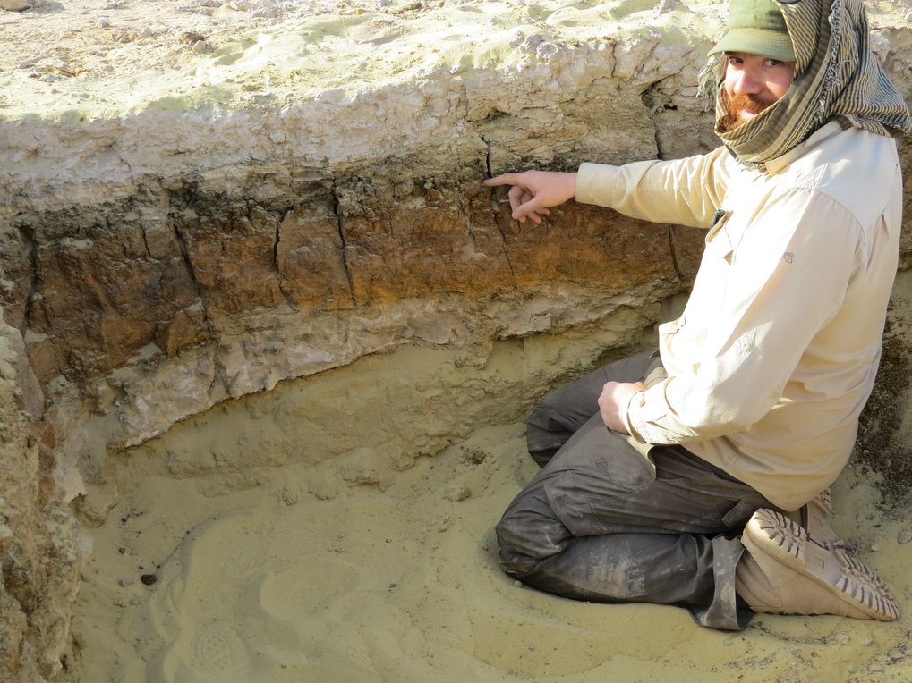 How did human societies respond to abrupt environmental change in challenging areas such as arid deserts? Extreme Events Research Group leader Huw Groucutt excavating 200 thousand year old sediments in containing human-made stone tools and animal fossils in Arabia.