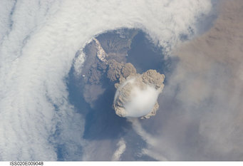 The aerosol clouds from volcanic eruptions are often visible from space and can reside in the atmosphere for several years. This image of a volcanic eruption in the Kuril Islands was taken from the International Space Station in 2009. The aerosol clouds from volcanic eruptions are often visible from space and can reside in the atmosphere for several years. This image of a volcanic eruption in the Kuril Islands was taken from the International Space Station in 2009.