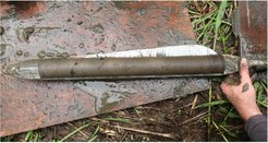 A 50-cm sediment core sequence extracted by a peat borer from a lake in the northern Kanto Plain, central Japan, identified as a suitable archive of climate- and human-induced environmental change. The black inclusions on the left are fruits of water caltrop (Trapa natans), useful material for radiocarbon (14C) dating to build a chronology for the sediment core.
