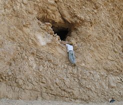 The entrance of Yoram Cave in an almost vertical cliff, some four meters above the trail leading to the cave