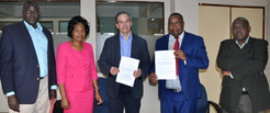 Prof. Michael Petraglia and colleagues from the National Museums of Kenya, including Director General Dr. Mzalendo Kibunjia, at the MOU signing.
