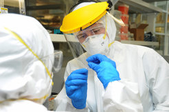 Warinner conducting genetic investigations of archaeological dental calculus. This work requires dedicated ancient DNA laboratories and strict clean room conditions.